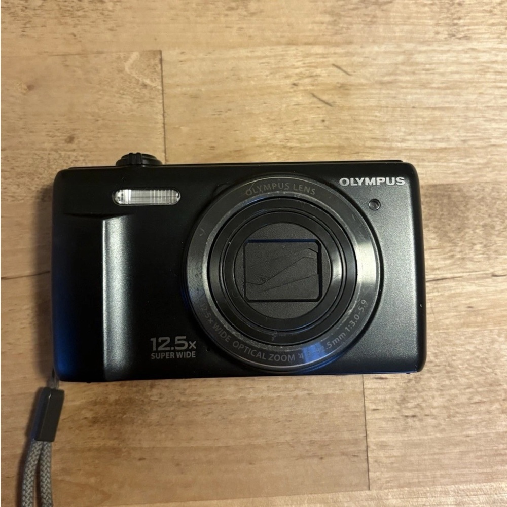 Olympus Black Digital Camera with 12.5x Super Wide Zoom